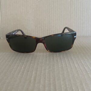 Persol PO2803S sunglasses in Havana brown acetate with green lenses.